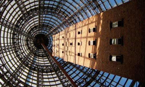 mental cage cone stucture and brick building